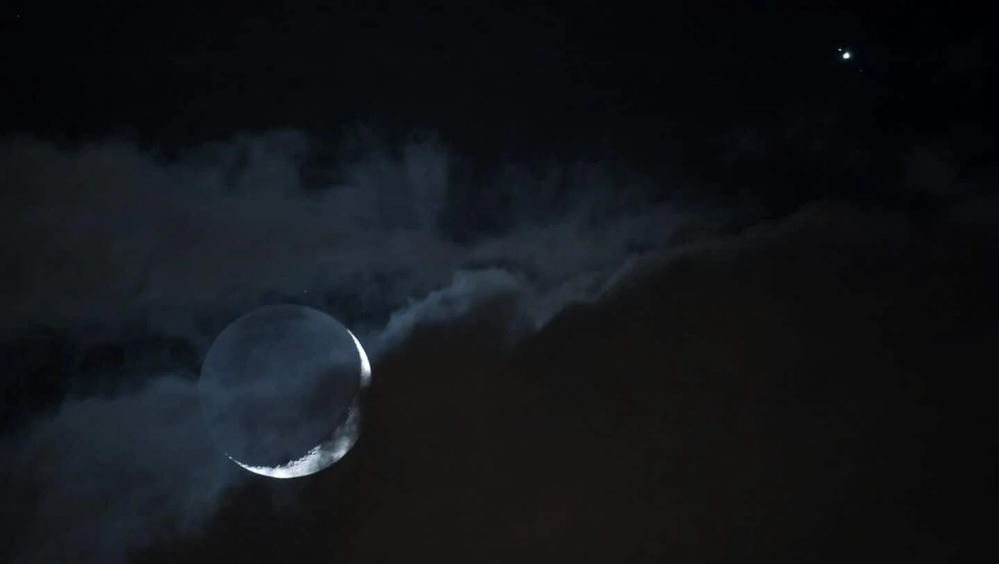 See Jupiter glow beside the waxing moon after sunset on May 20 - 1