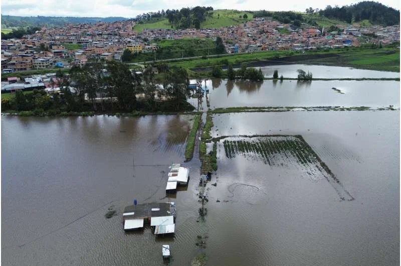 Climate report says world won't get as hot as feared but will pass warming limit - 2
