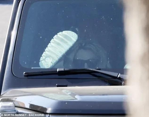 Britney Spears spotted with bruised legs as she breaks cover after wild night out at restaurant and liquor store - 4