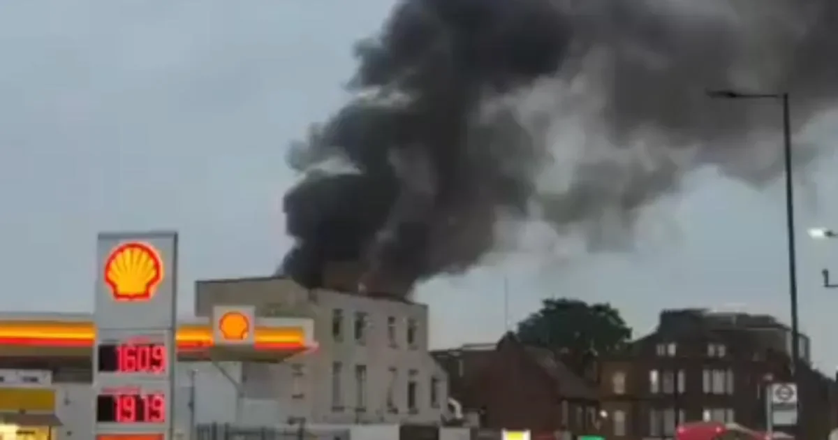 Clapton fire: Huge blaze at block of flats under investigation as column of smoke seen across London - 1