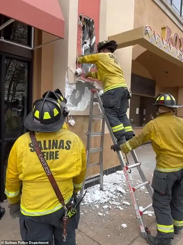 Man plunges 22 feet off movie theater roof into wall space and is only rescued 12 hours later when customers heard muffled cries for help - 4