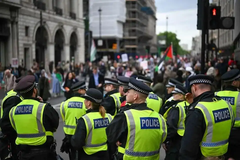 London police were out in force to deal with rival rallies and a soccer final - 3