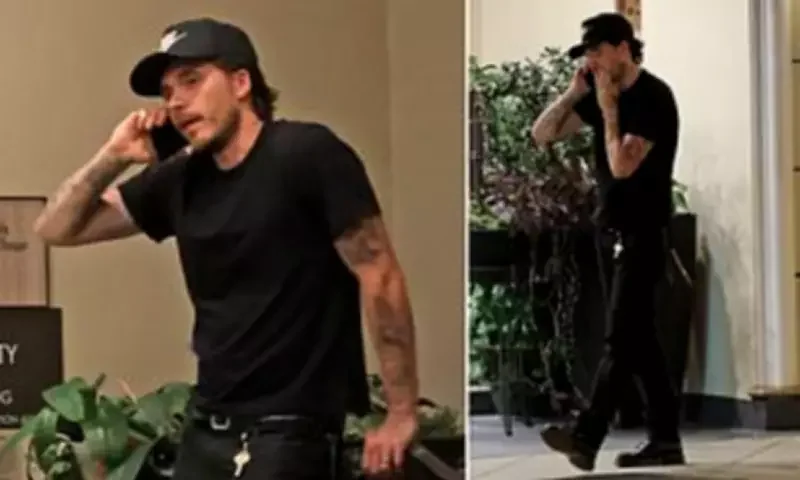 Brooklyn Beckham takes a tense phone call during outing in LA after wife Nicola Peltz's latest 'dig' at mum Victoria amid ongoing family feud - 1