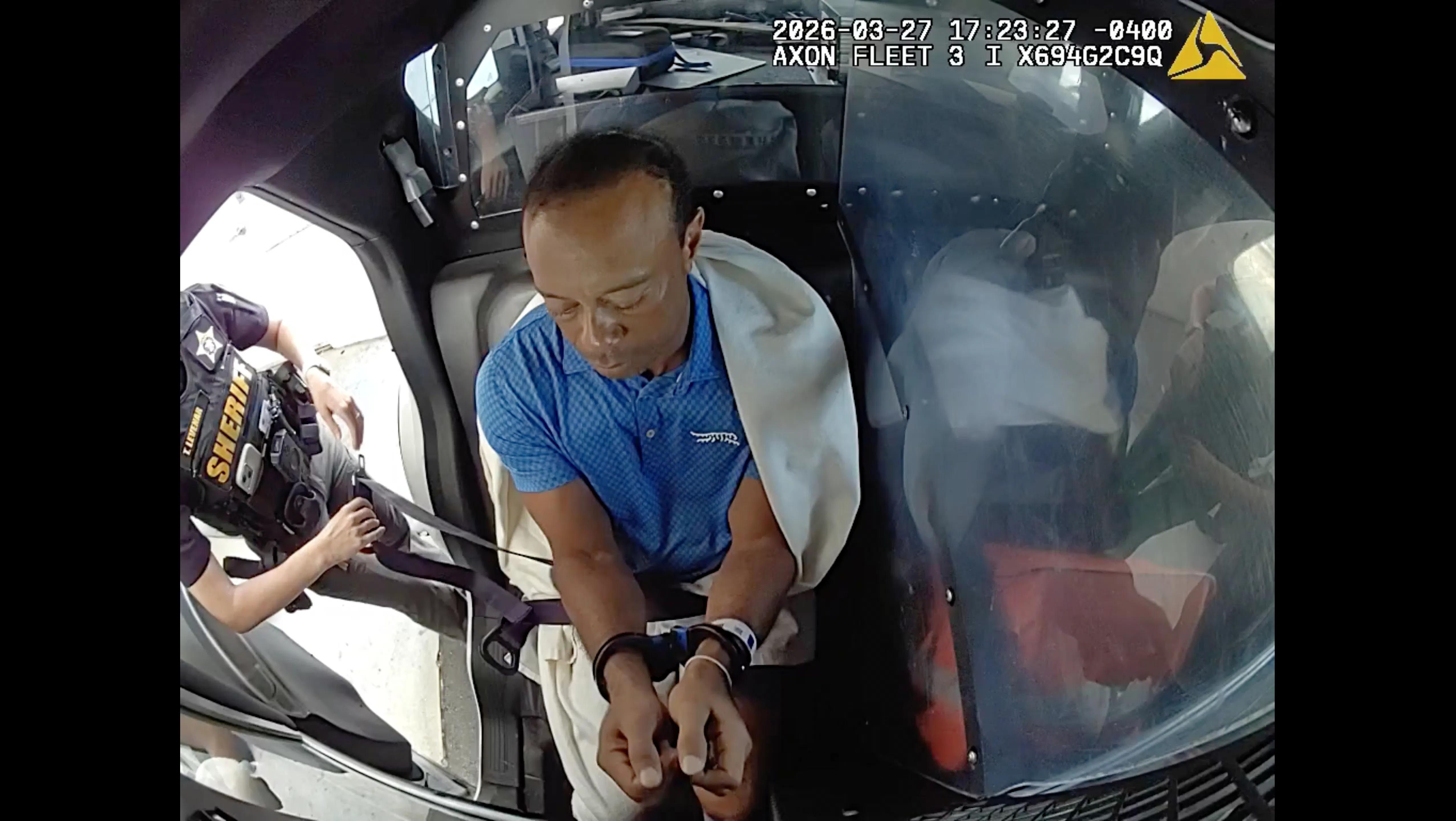 After crash, Tiger Woods told deputy he was 'talking to the president,' body camera shows - 1