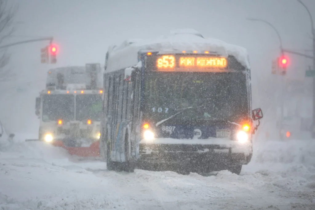 Millions under road travel bans as blizzard conditions slam US north-east - 4