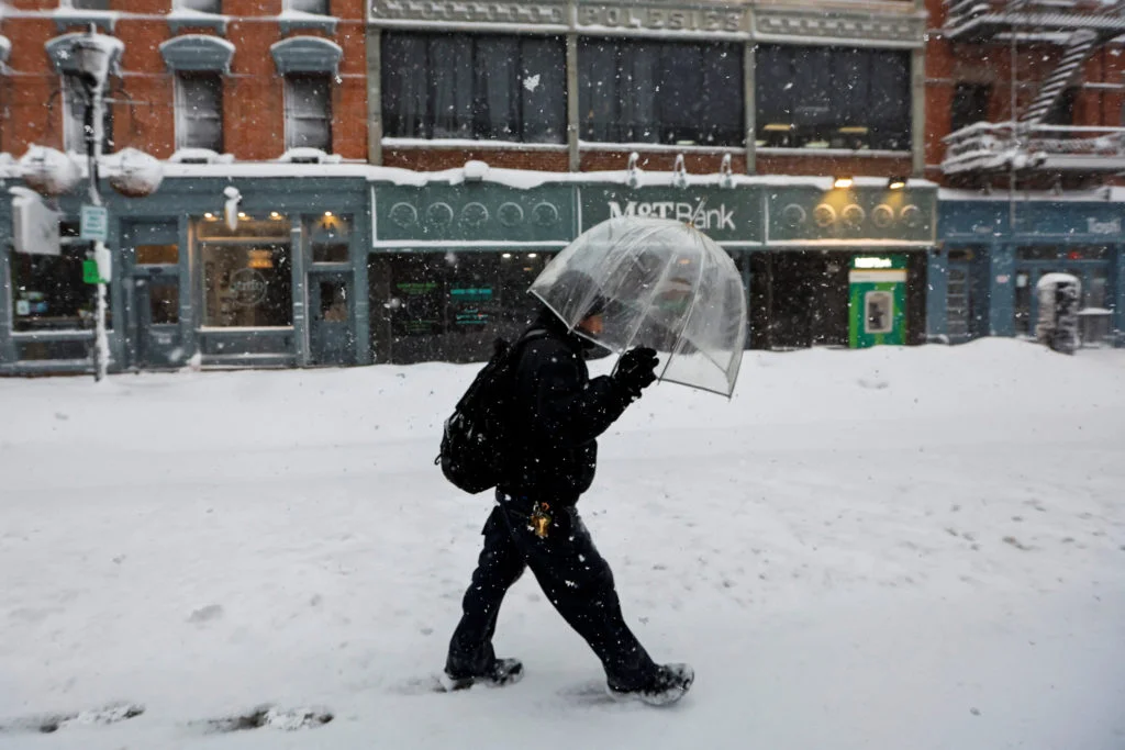 Millions under road travel bans as blizzard conditions slam US north-east - 3