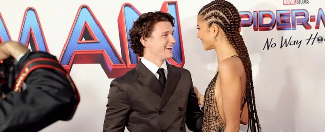 Zendaya continues to fuel Tom Holland marriage rumours with gold band and bridal white look in Paris - 1