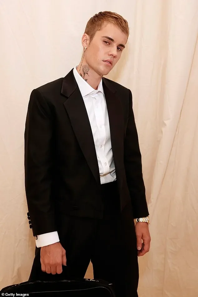 Justin Bieber looks jovial with wife Hailey in first sighting since his 'heated exchange' with ex-mentor Usher at Oscars party - 2