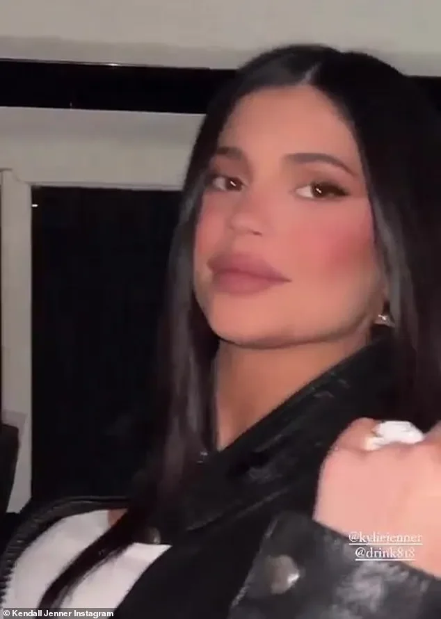 Kendall Jenner flashes abs in tight white tank top and shorts as she hits Coachella with sisters Kylie and Kourtney Kardashian - 2