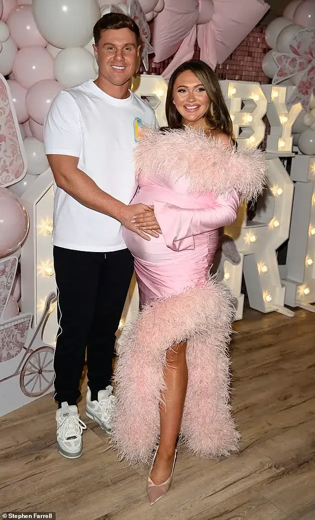 Charlotte Dawson cuts a glamorous figure in a plunging pink dress as she packs on the PDA with fiancé Matt Sarsfield at the Aintree Grand National Festival - 2