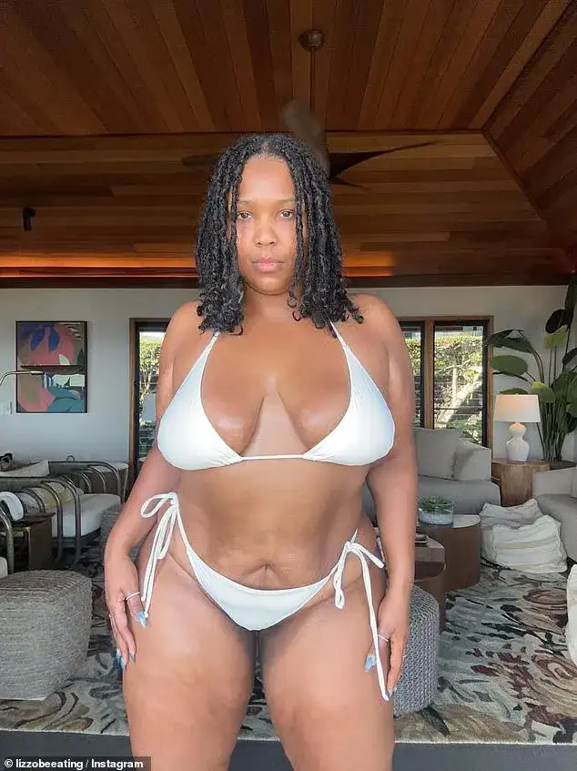 Lizzo reveals she's two months sober from alcohol...after losing 60lbs through diet and exercise - 1