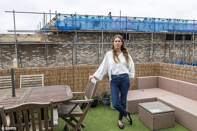 Mother whose sea view was blocked by illegal wall is shocked as council back developers who built it - 3