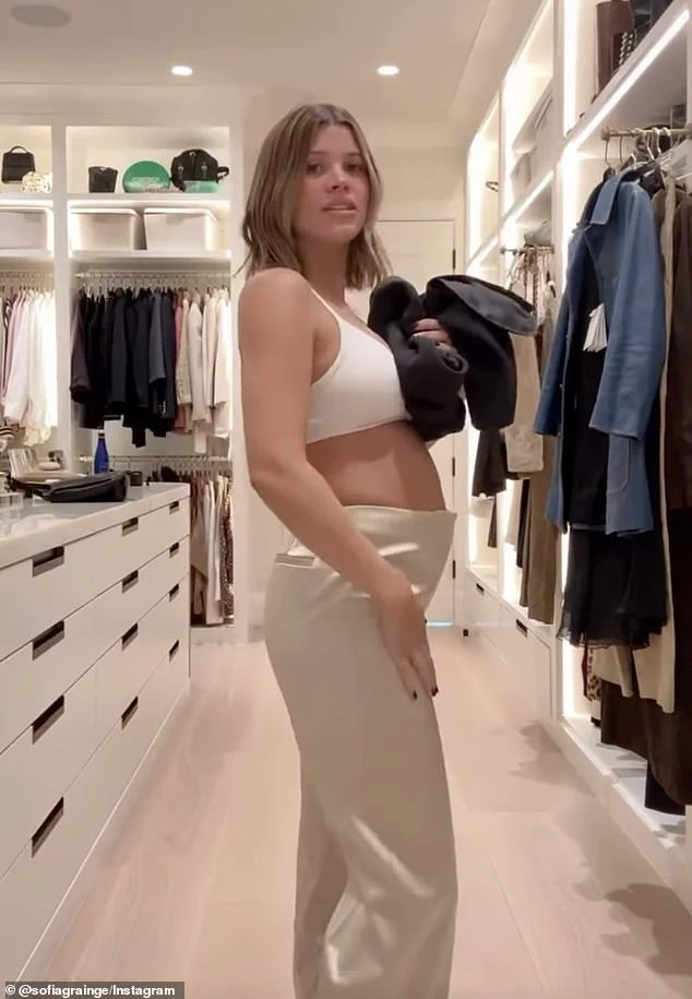 Sofia Richie gives rare look at baby bump in a bra and pants... ahead of birth of second child - 2