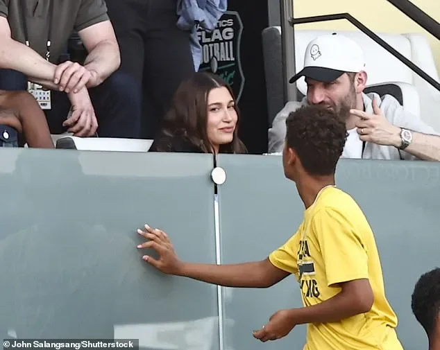 Justin Bieber looks jovial with wife Hailey in first sighting since his 'heated exchange' with ex-mentor Usher at Oscars party - 1