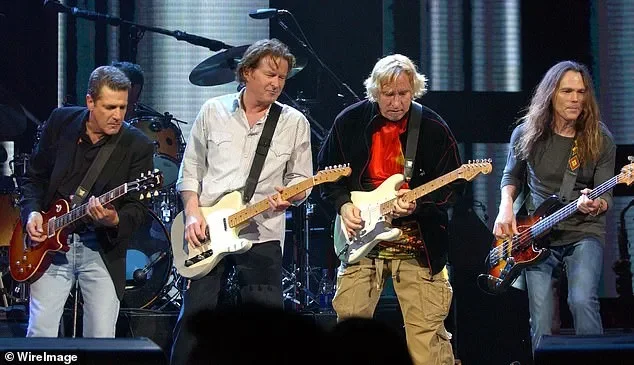 Iconic 70s bassist from legendary band surfaces on rare Malibu outing... can you guess who? - 2