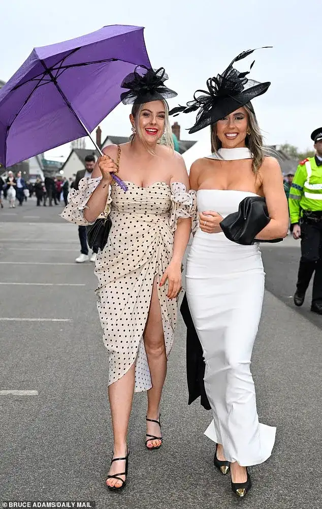Here come the girls! Glamorous Aintree revellers don daring frocks to kick off the Grand National festival in style - 1