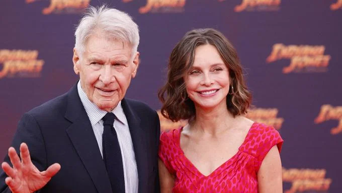 Harrison Ford, 83, and Calista Flockhart, 61, kiss on the tarmac as they arrive back in LA on Valentine's Day - 1
