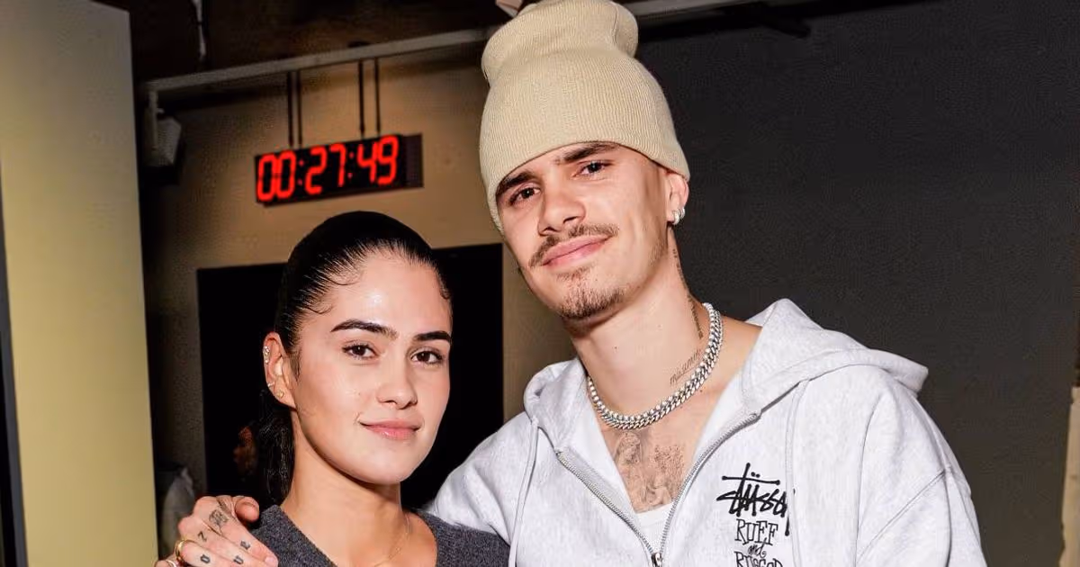 Romeo Beckham's rumoured ex Caroline Daur turns heads at Victoria's Paris Fashion Week show as she wears striking red gown from her collection - 1