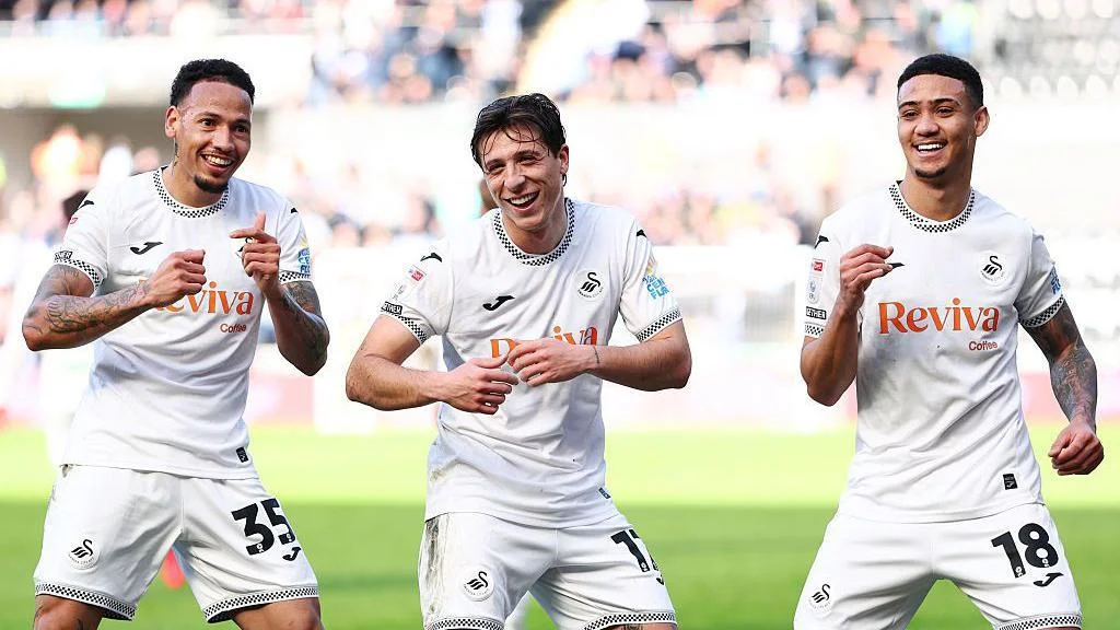 Owls set unwanted record as Swansea cruise to win - 1