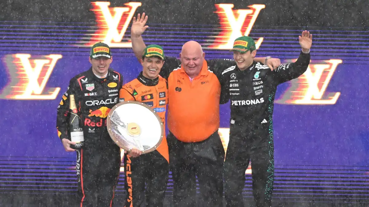 Delta Goodrem stuns in slick outfit at F1 Australian Grand Prix in Melbourne - While golfing legend Greg Norman turns heads in stylish all-black ensemble - 4