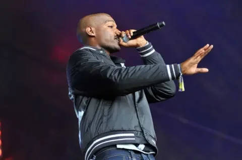 Tributes paid as grime star Dot Rotten dies, aged 37 - 2