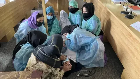 For years the Taliban told women to cover up in public. Now they're cracking down - 4