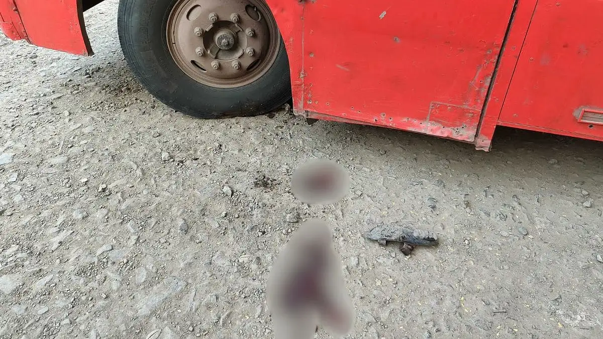 Man crushed under bus during repair - 1