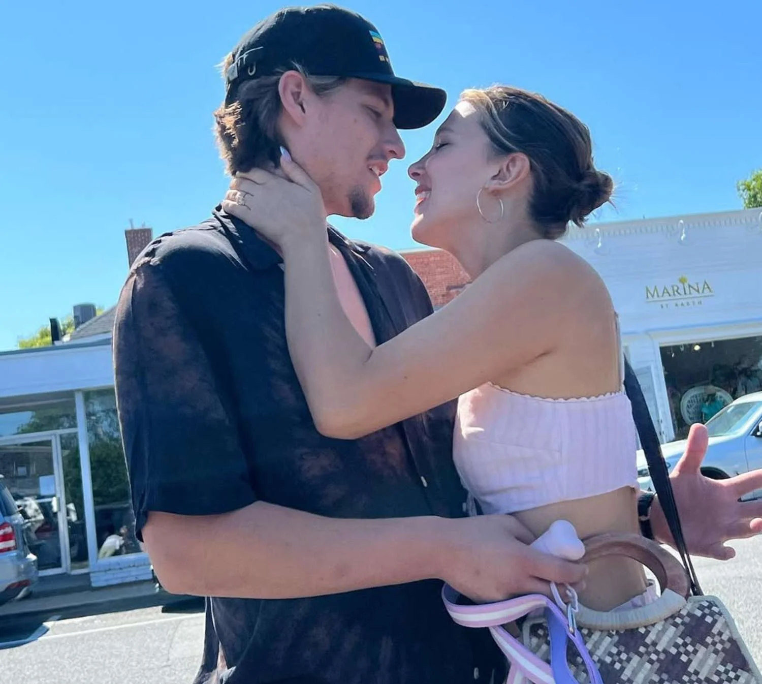 Millie Bobby Brown forces a smile with Jake Bongiovi on her 22nd birthday months after welcoming first child - 4
