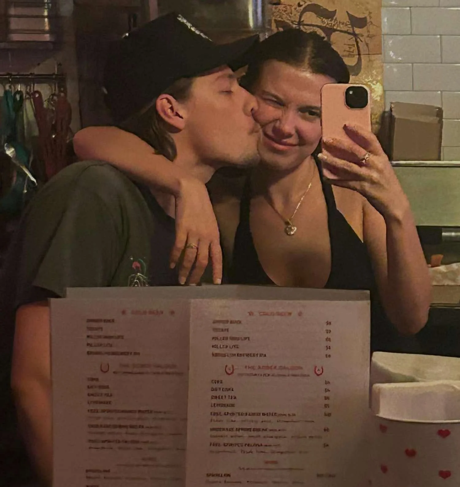 Millie Bobby Brown forces a smile with Jake Bongiovi on her 22nd birthday months after welcoming first child - 2