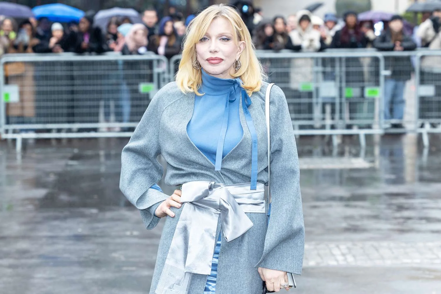 Courtney Love posts picture of herself reading 'the guide to becoming alive' as new report claims her late husband Kurt Cobain's death was a 'homicide' - 4