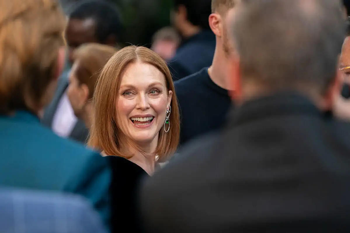 Julianne Moore makes rare red carpet appearance with her family at Love Rocks NYC - 2